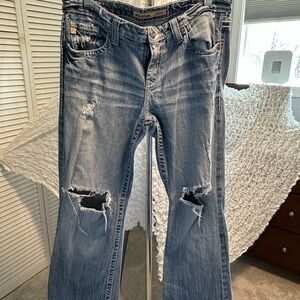 Distressed Blue Jeans
